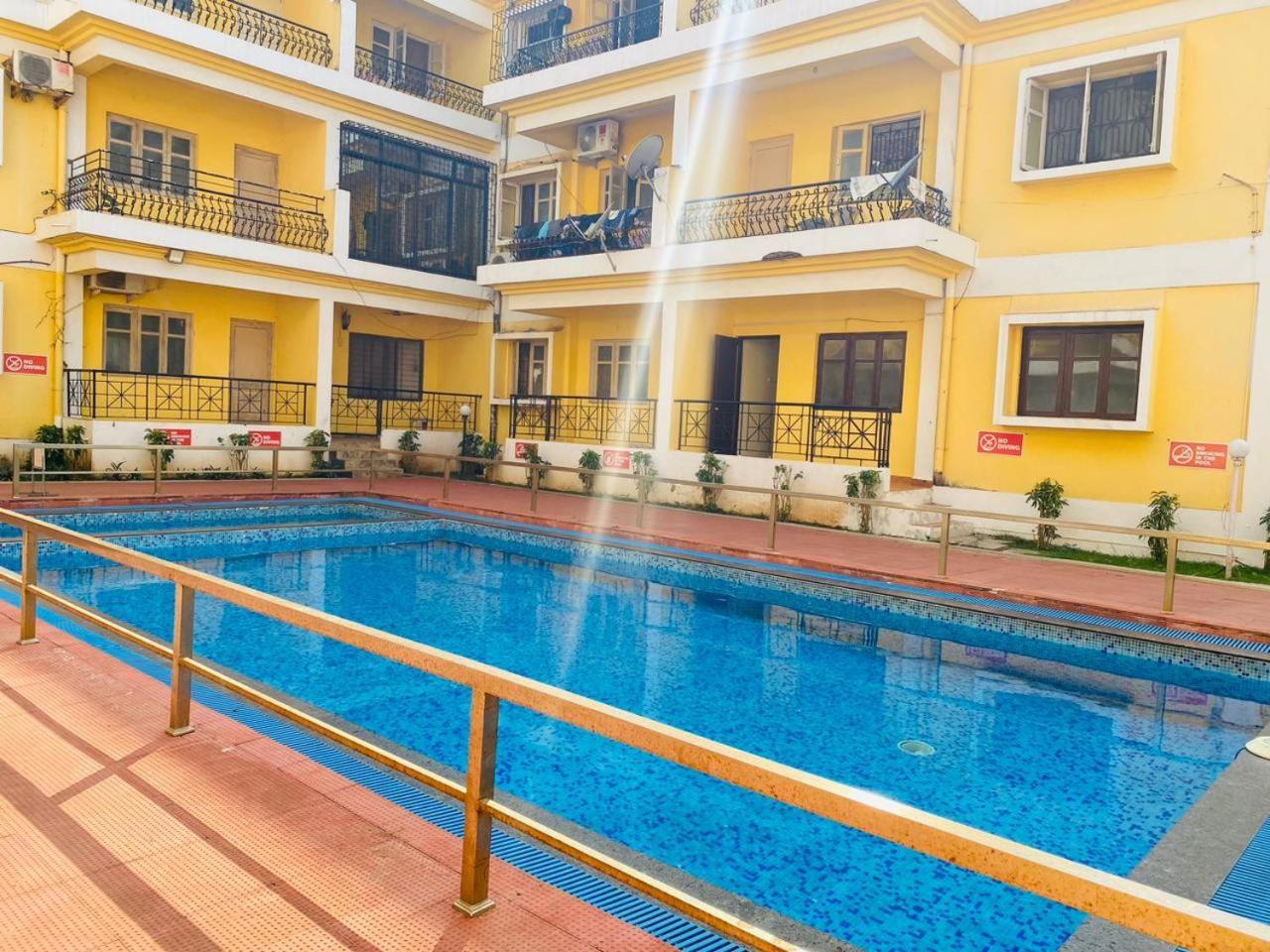 Haven Apartment Inn Baga Beach ภายนอก รูปภาพ